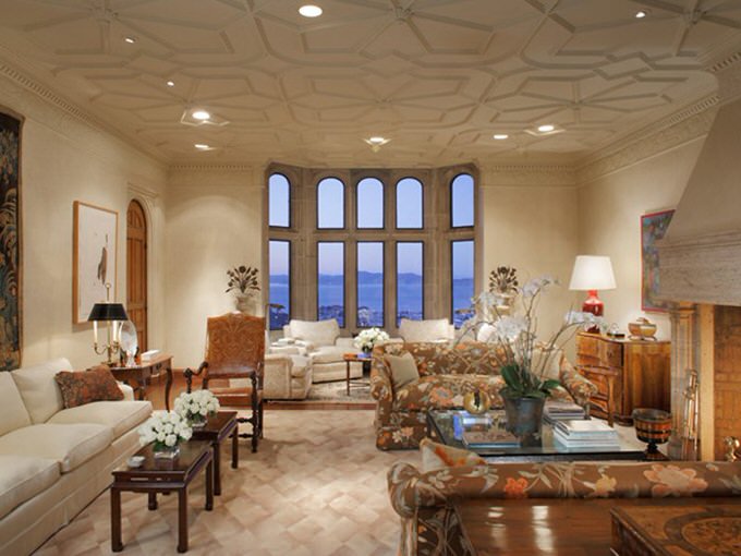 The formal sitting room has a lovely pattern on the ceiling